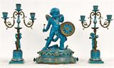 53. FRENCH THREE PIECE FAIENCE AND METAL CLOCK GARNITURE SUITE