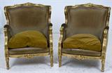 66. TWO LOUIS XVI STYLE GILTWOOD AND CARVED BERGERES