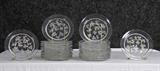 94. TWENTY-SIX LALIQUE MOLDED CRYSTAL DESSERT PLATES