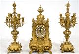 220. FRENCH GILT BRONZE THREE PIECE CLOCK GARNITURE