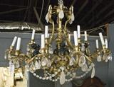 261. LOUIS XV STYLE EIGHTEEN-LIGHT BRONZE AND ROCK CRYSTAL CHANDELIER