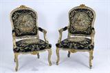 451. SET OF FOUR ITALIAN BAROQUE STYLE PAINTED AND PARCEL GILT ARMCHAIRS