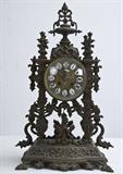 464. FRENCH BRONZE MANTLE CLOCK