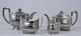 520. ASSEMBLED REGENCY SILVER FOUR-PIECE TEA SET