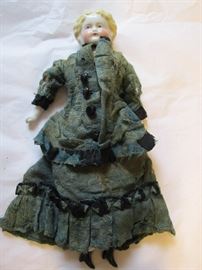 c1870's porcelain and straw doll