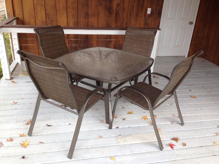 Square Dark Brown Metal & Plexiglass Top Patio Dining Table and Four Dark Brown Metal Mesh Fabric Patio Dining Arm Chairs