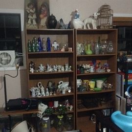 Collectibles. Breakables. Jars and vases. Bottles. Lamp table. DVD player.