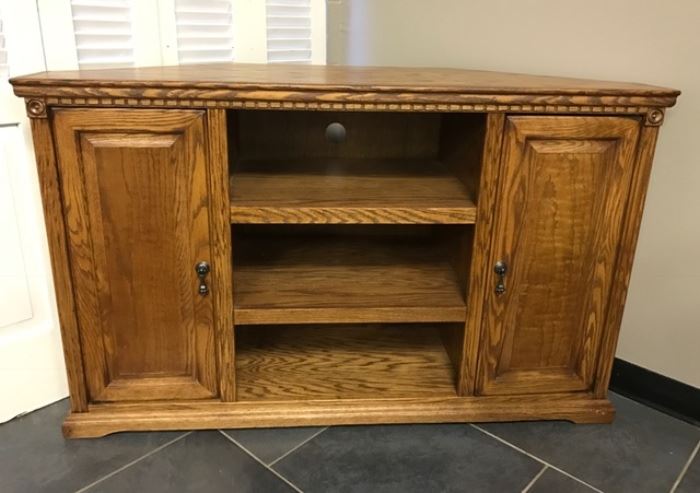 Solid oak corner entertainment. Perfect for space savings.