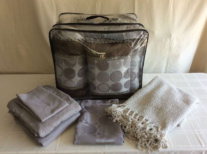 Lot # 7 - Queen comforter, 2 pillow shams, 3 decorative pillows, shower curtain, sheet set and throw blanket - $ 50.00