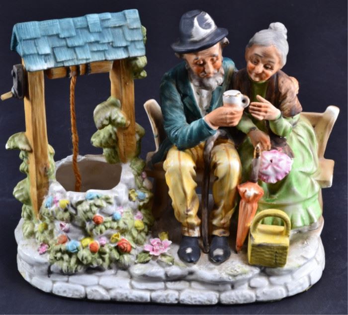 48: Ceramic Seated Couple at Wishing Well