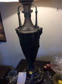 A large metal urn fitted as a lamp