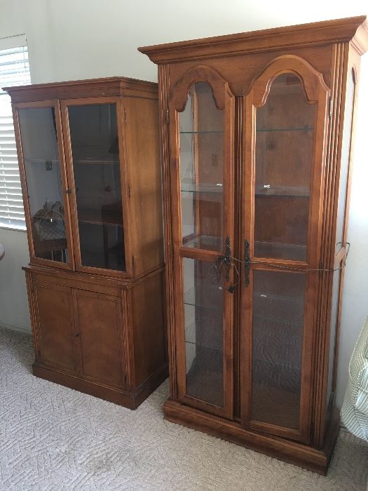 Two of three glass fronted bookcases/display cases. With adjustable shelving, storage.  Wood. 