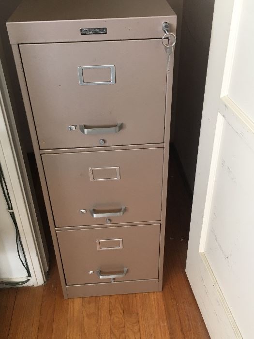 One of many steel case heavy duty filing cabinets with locks.
