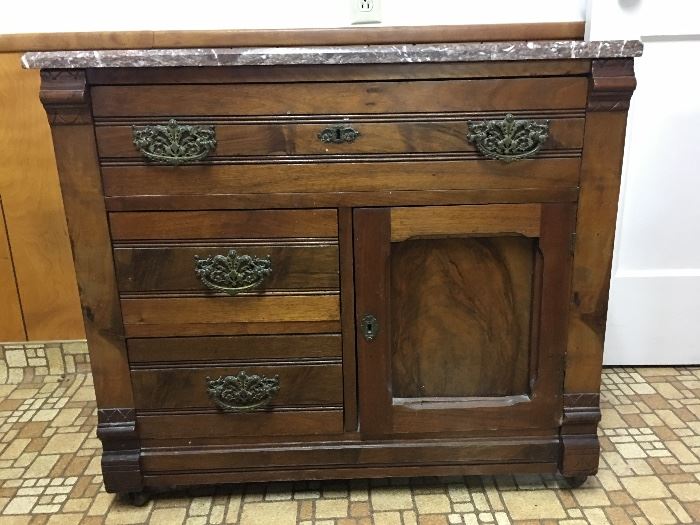 Antique cabinet with marble top.  Original hardware.  Nice piece