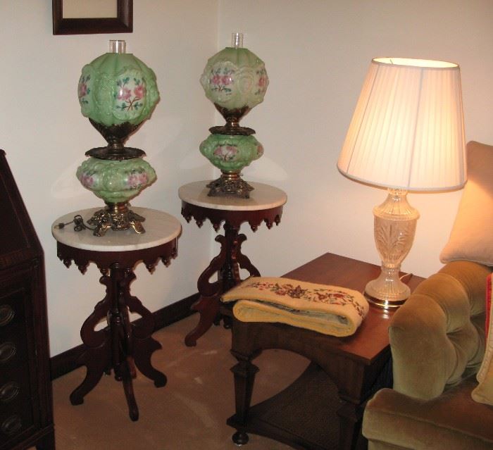 The Gone With the Wind Lamps shown here with the Victorian round marble top tables.