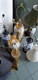 Pair of nice blue and white lamps and a a pair of hand painted gilt lamps