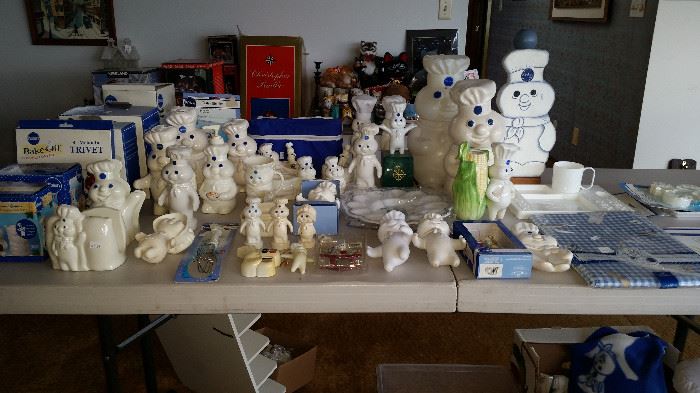 Large collection of Pillsbury Dough Boy collectibles.  Including phone, clock radio and cookie jar and much more