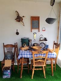 Sunroom: Vintage Taxidermy Duck, Vintage Pressback Wood Chairs, Antique Kitchen Ladderback Chair, Vintage TLC Kitchen Table, Antique / Vintage Roller Skates, Arctic Boy Water Cooler Jug
