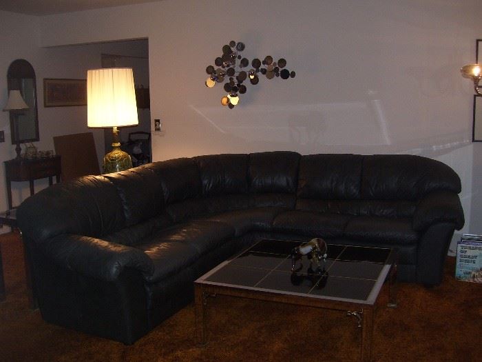 Leather sectional, Mastercraft coffee table.