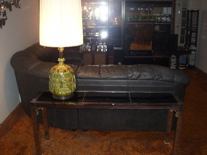 Mastercraft sofa table and mid century pottery lamp.