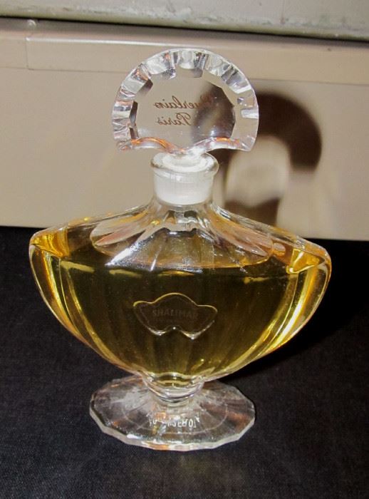 2 oz. bottle of Shalimar Paris Perfume. Stopper was reversed when I took the picture.