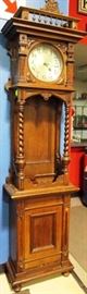 Unusual spindle adorned tall clock