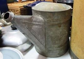 metal watering can