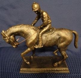 Jockey on horse statue