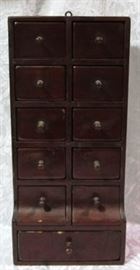 Antique spice cabinet