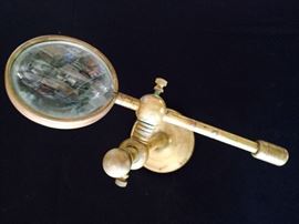 old brass jewler's magnifier