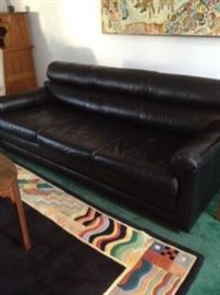 Leather Sofa & Abstract Rug