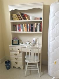 Detail of the white-washed desk and chair. Books are also for sale!
