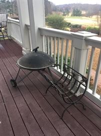 Outdoor rolling fire pit and metal firewood rack