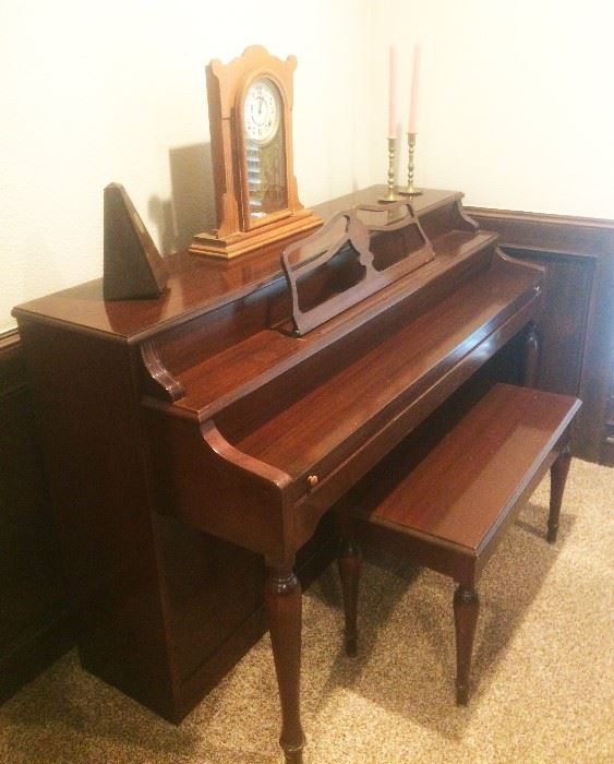 piano, metronome, candlesticks