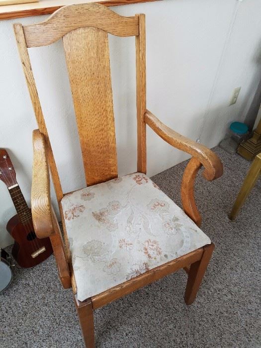 One of 6 Chairs that go with round table/leaf