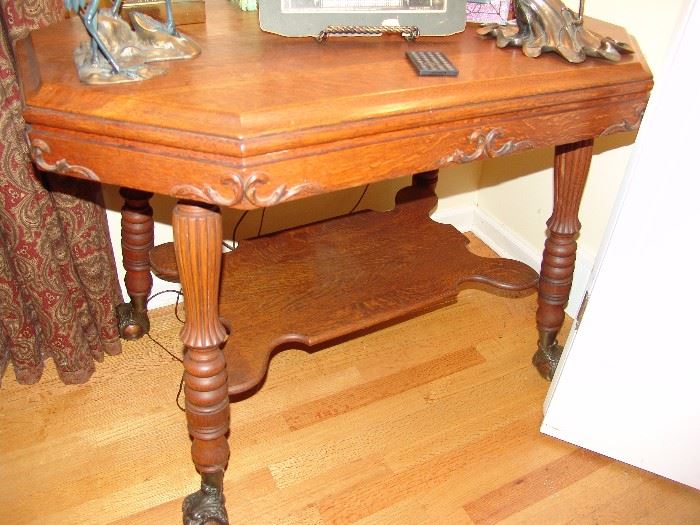 Oak side table with glass claw feet