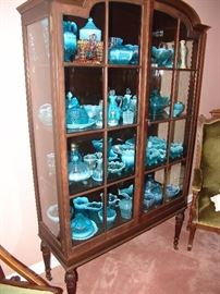 China cabinet with large collection of opalescent glass