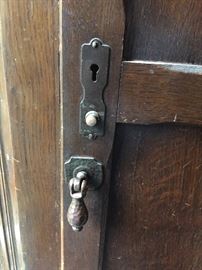Metal latch on antique cabinet 