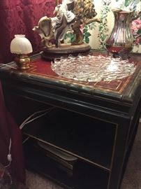End table with leather inset with Armani signed lamp. One of a pair. 