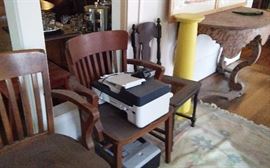 Fortuny covered console table on right. Old desk chairs. Printers- two available. Rug also available.