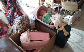 Pair of toy doll cribs and several old stuffed toys and dolls from the 50's