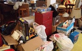 Mostly toys here. Hot wheels box, McDonalds toys, games and cards, Darth Vader helmut, twister, chess, etc, etc.