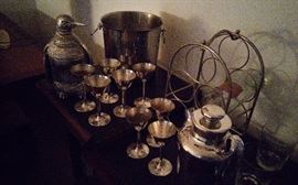 Silver plate penguin bottle server, silver plate martini set, servers, bar ware..etc