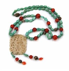 33. JADE TURQUOISE NECKLACE青白玉綠松石項鍊A turquoise necklace punctuated by red beads and with a jade openwork pendant with the character for Double Happiness that used for weddings and martial happiness. 123g L:19in
