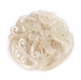 49. JADE CARVED SHO PENDANT白玉雕吉祥如意佩Carved in high relief, this openwork jade toggle has the character for longevity.25g  D:3 1/8in
