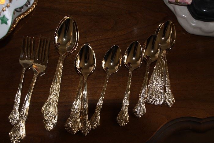 Wide variety of gold plate placesettings