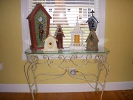 Iron & glass table with decorative birdhouses