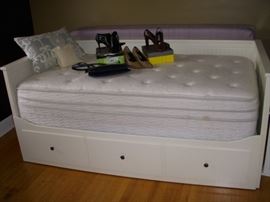 IKEA trundle bed with pull-out trundle & 3 storage drawers.  Mattress for trundle stored behind bed (against wall in photo)