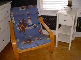 Rodeo-themed chair beside IKEA one-drawer stand