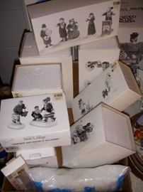 Snow Village figures in boxes
